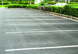 Parking lot showing freshly painted lines for parking spaces