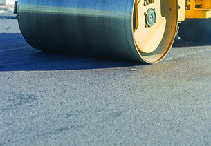 Steam Roller on asphalt road